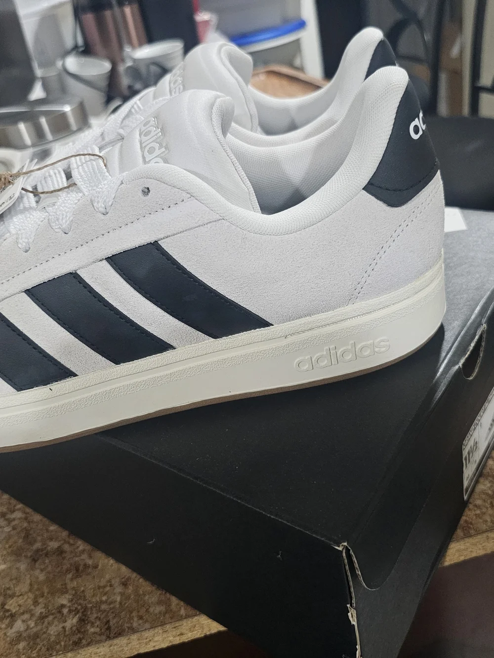 Adidas White Suede Sneakers with Black Stripes